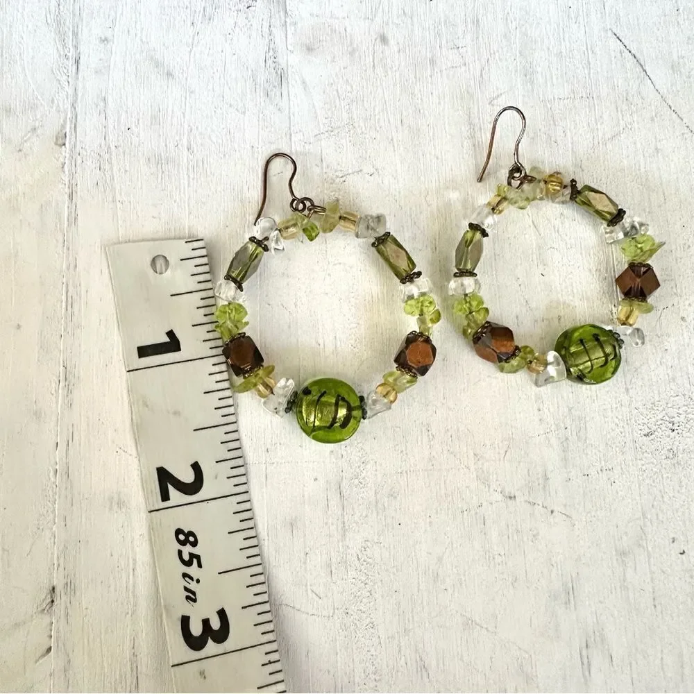 Green beaded circle earrings